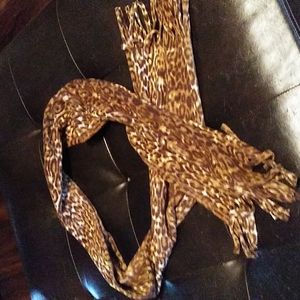 Leopard print scarf.5 ft long 3 ft wide fringed on ends